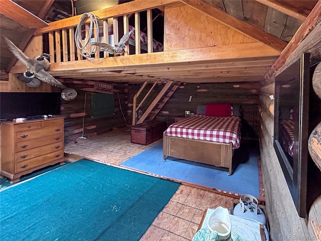 unfurnished bedroom featuring lofted ceiling