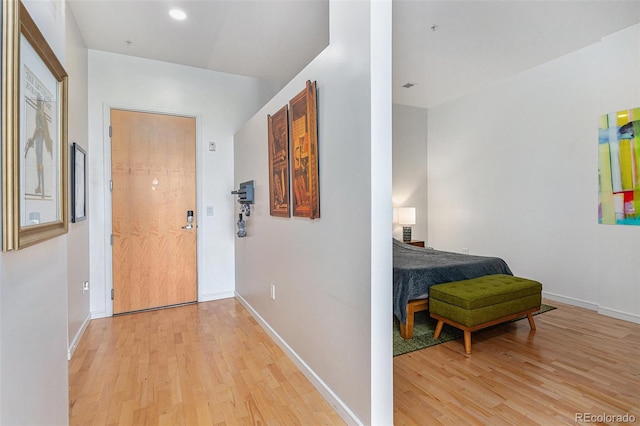 2958 Syracuse St Unit 403, Denver, CO 80238 - corridor with light wood finished floors and baseboards