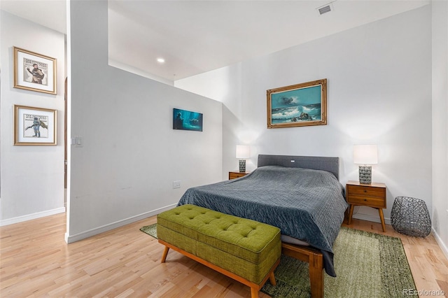 2958 Syracuse St Unit 403, Denver, CO 80238 - bedroom with light wood-style floors, baseboards, and recessed lighting