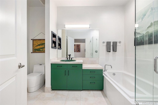 2958 Syracuse St Unit 403, Denver, CO 80238 - bathroom featuring toilet, vanity, a bath, a shower with shower door, and tile patterned flooring