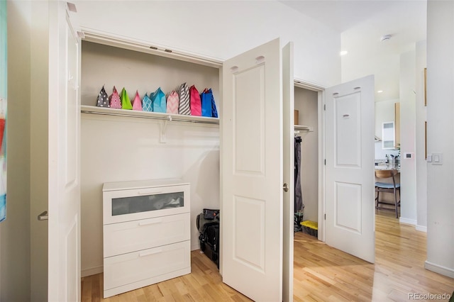 2958 Syracuse St Unit 403, Denver, CO 80238 - laundry room with light wood-style flooring