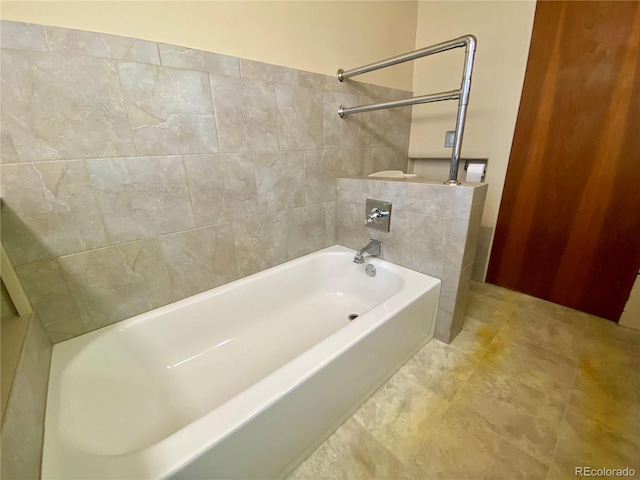 bathroom featuring tiled shower / bath combo