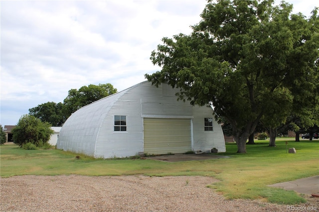 exterior space with a yard