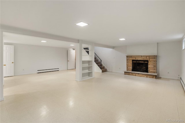 1840 E 84th Ave, Denver, CO 80229 - unfurnished living room featuring a baseboard heating unit, stairway, a stone fireplace, and recessed lighting