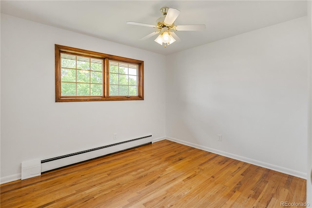 1840 E 84th Ave, Denver, CO 80229 - empty room with a baseboard heating unit, light wood finished floors, and a ceiling fan