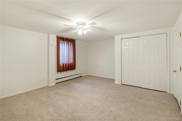 1840 E 84th Ave, Denver, CO 80229 - unfurnished bedroom with a baseboard heating unit, carpet flooring, a ceiling fan, and a closet
