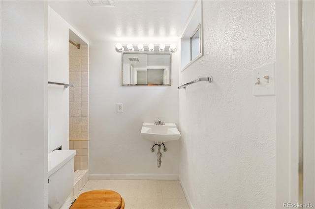 1840 E 84th Ave, Denver, CO 80229 - bathroom with a shower and tile patterned floors