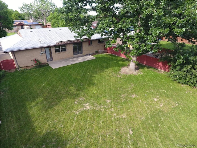1840 E 84th Ave, Denver, CO 80229 - view of grassy yard with a patio area