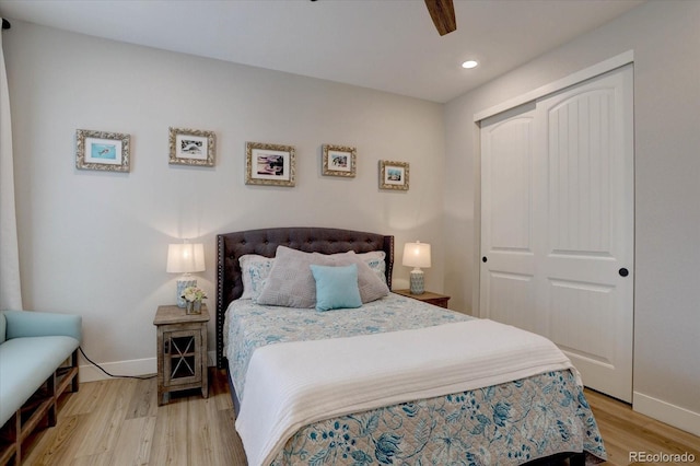 527 Felicity Loop, Castle Rock, CO 80109 - bedroom with light wood finished floors, baseboards, a closet, and recessed lighting
