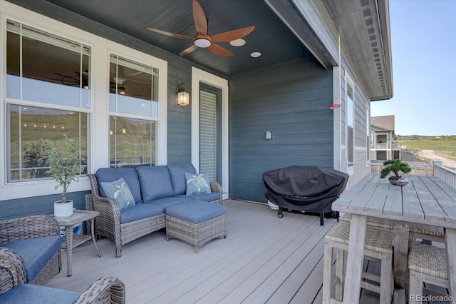 527 Felicity Loop, Castle Rock, CO 80109 - wooden terrace featuring a ceiling fan and outdoor lounge area