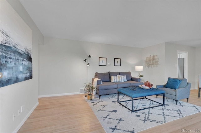 living room featuring light wood-type flooring