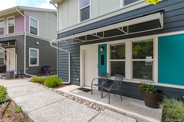 2829 W 53rd Ave Unit 104, Denver, CO 80221 - view of exterior entry featuring board and batten siding