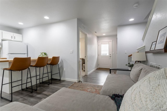 2829 W 53rd Ave Unit 104, Denver, CO 80221 - living area with wood finished floors and recessed lighting