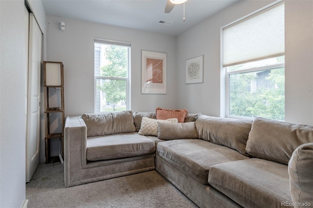 2829 W 53rd Ave Unit 104, Denver, CO 80221 - living room featuring carpet and a ceiling fan