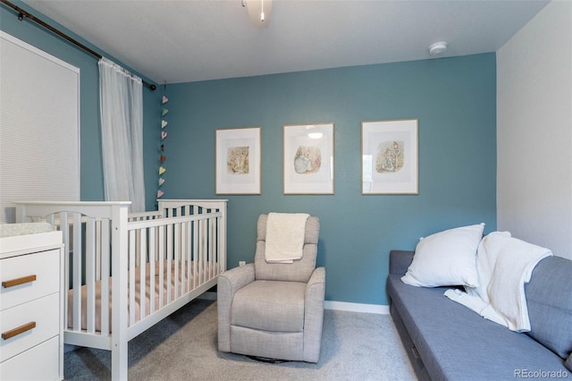 2829 W 53rd Ave Unit 104, Denver, CO 80221 - carpeted bedroom featuring baseboards