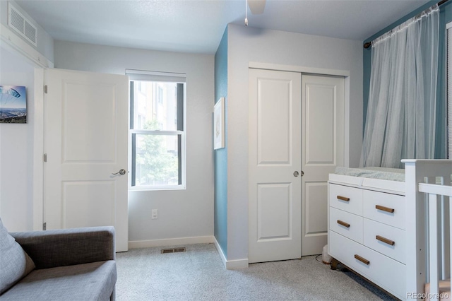 2829 W 53rd Ave Unit 104, Denver, CO 80221 - living area with light colored carpet and baseboards