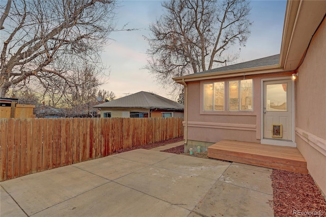 patio terrace at dusk with fence