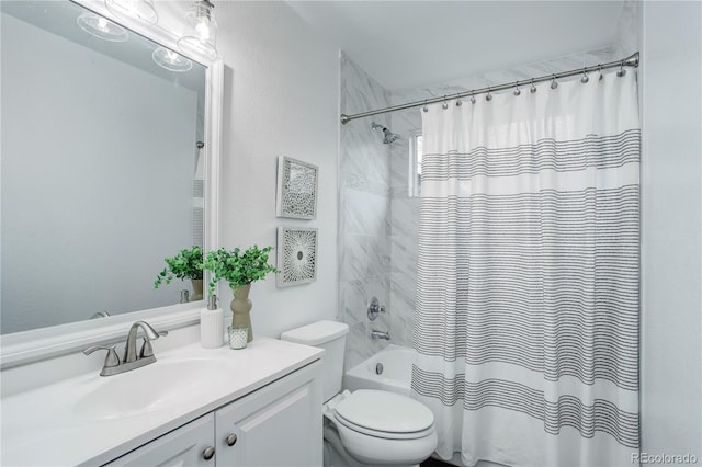 bathroom with vanity, toilet, and shower / tub combo