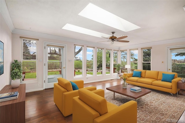 sunroom / solarium with french doors and a skylight