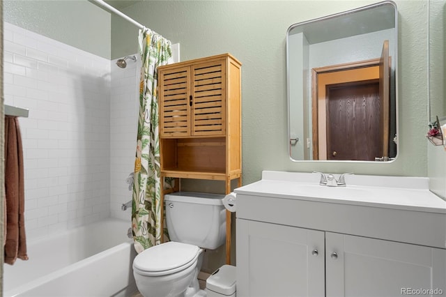 full bathroom featuring vanity, toilet, and shower / bath combo with shower curtain