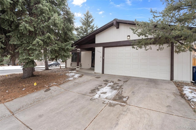 ranch-style home featuring a garage