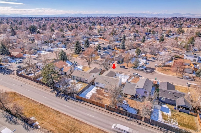 birds eye view of property featuring a mountain view