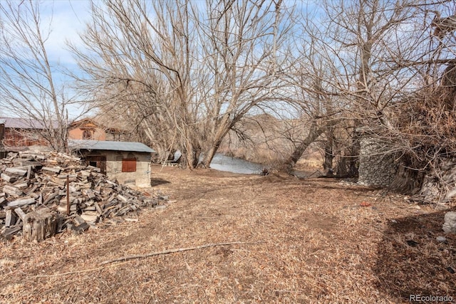 view of yard with a water view