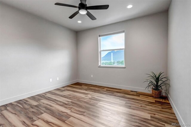 265 Upper Glenway, Palmer Lake, CO 80133 - empty room featuring wood finished floors, recessed lighting, and a ceiling fan