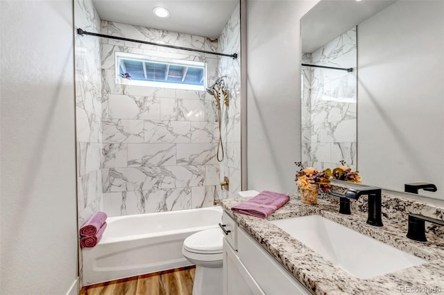 265 Upper Glenway, Palmer Lake, CO 80133 - bathroom with vanity, shower / washtub combination, and wood finished floors