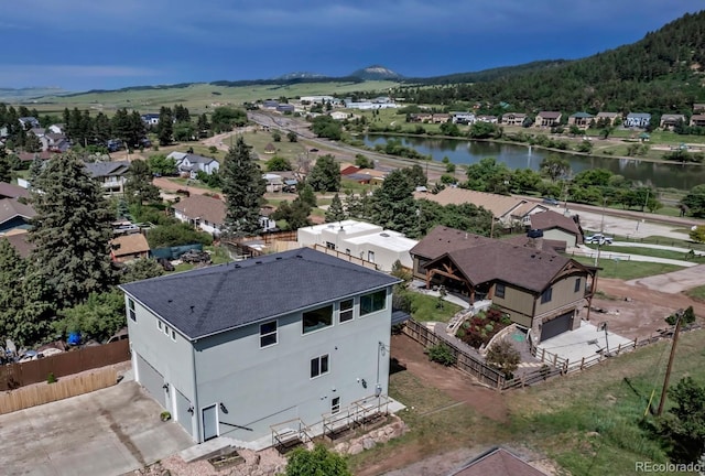 265 Upper Glenway, Palmer Lake, CO 80133 - aerial perspective of suburban area with a large body of water