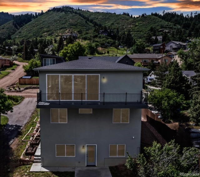 265 Upper Glenway, Palmer Lake, CO 80133 - view from above of property with a mountainous background