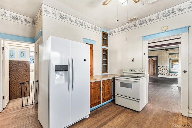 kitchen featuring wood-type flooring, white appliances, and ceiling fan