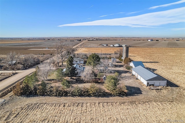 birds eye view of property featuring a rural view