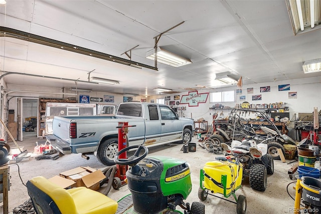 garage with a workshop area