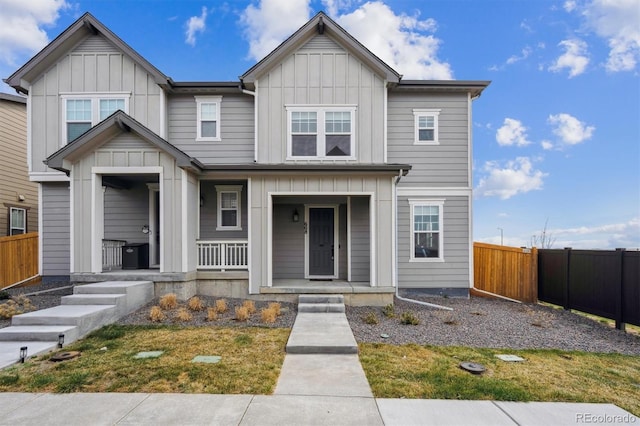 608 N Bersshine Ct, Aurora, CO 80137 - view of front of home with board and batten siding and a porch