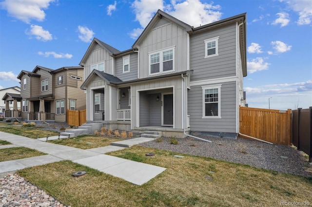 608 N Bersshine Ct, Aurora, CO 80137 - view of front facade featuring board and batten siding