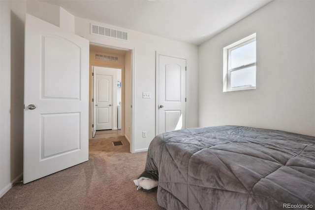 608 N Bersshine Ct, Aurora, CO 80137 - carpeted bedroom featuring baseboards