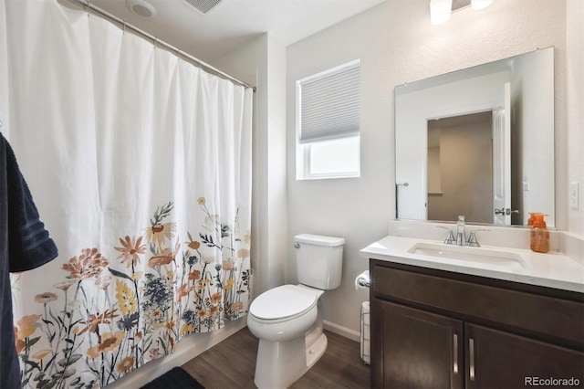 608 N Bersshine Ct, Aurora, CO 80137 - bathroom featuring vanity, wood finished floors, and a shower with curtain