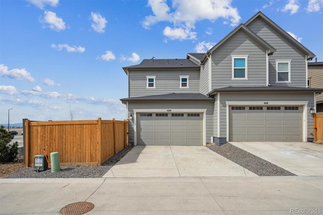 608 N Bersshine Ct, Aurora, CO 80137 - view of front of property with an attached garage and concrete driveway