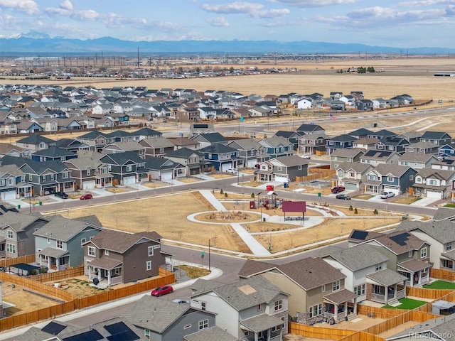 608 N Bersshine Ct, Aurora, CO 80137 - aerial perspective of suburban area with mountains