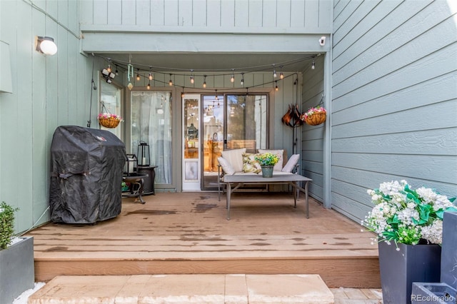 wooden terrace featuring grilling area