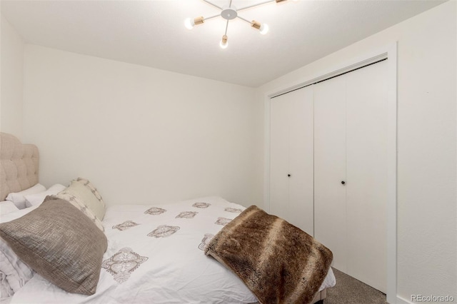 bedroom featuring carpet and a closet