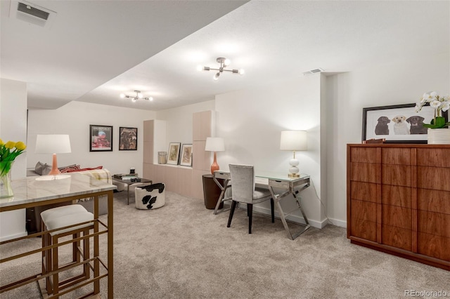 office featuring light carpet and visible vents