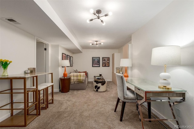 office space featuring light carpet, baseboards, and visible vents