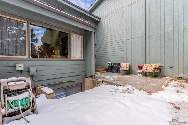 view of snow covered patio