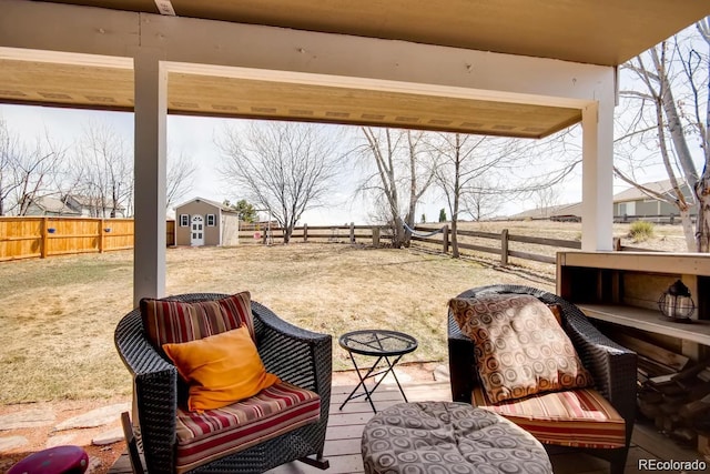 view of patio with a storage shed