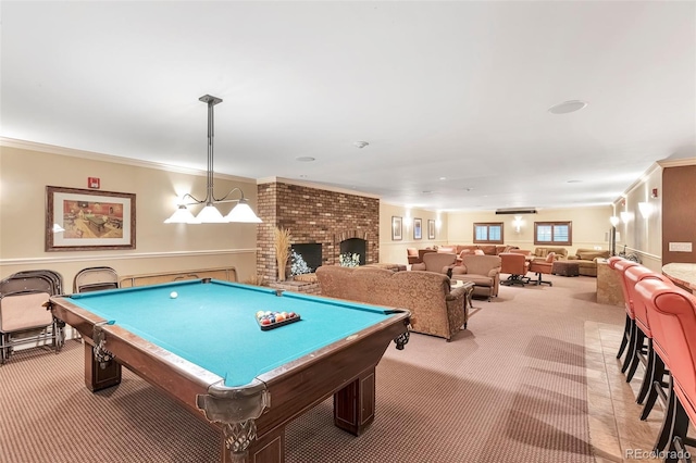 game room featuring pool table, ornamental molding, and light colored carpet