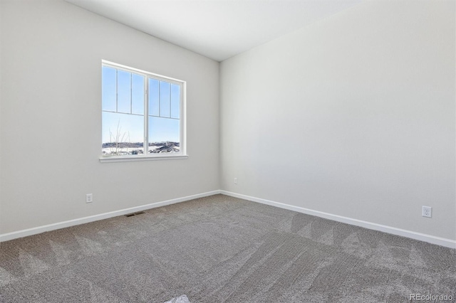 view of carpeted spare room