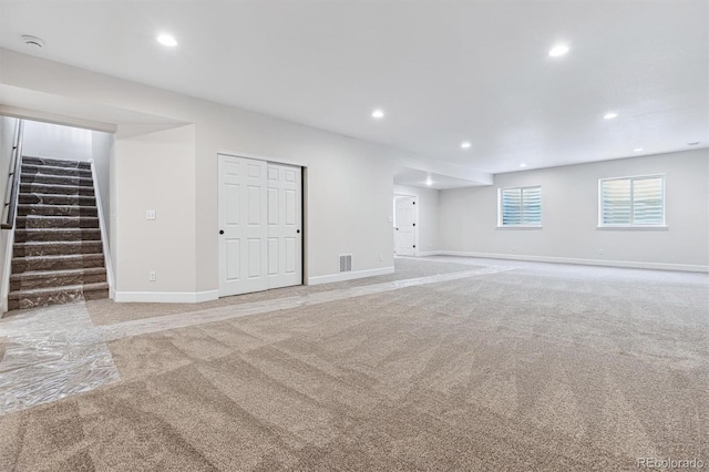 basement with light carpet