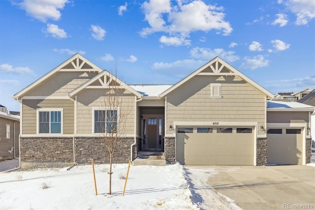 craftsman house with a garage